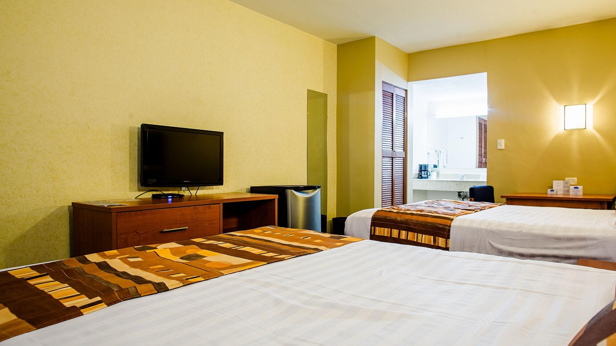 American Inn Hotel & Suites Parral Extérieur photo