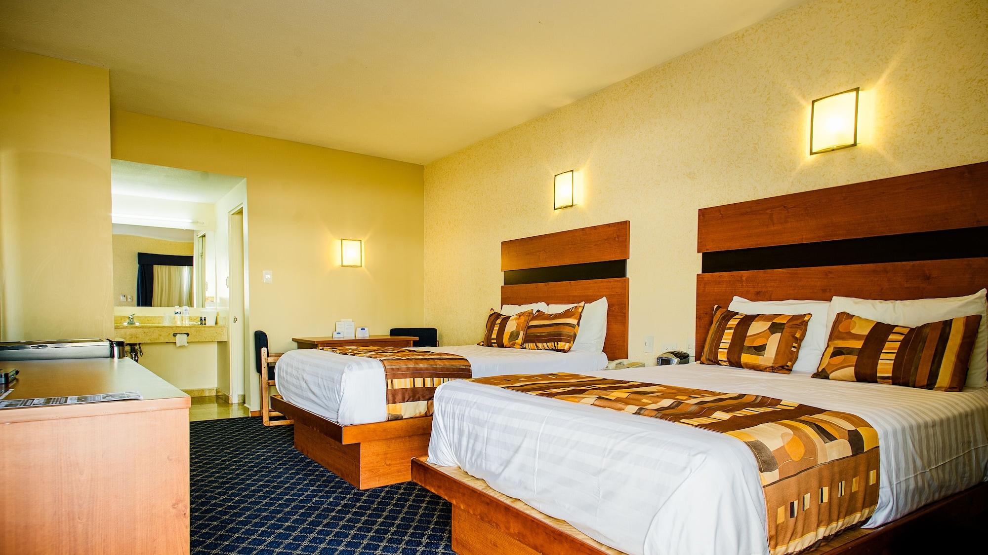American Inn Hotel & Suites Parral Extérieur photo