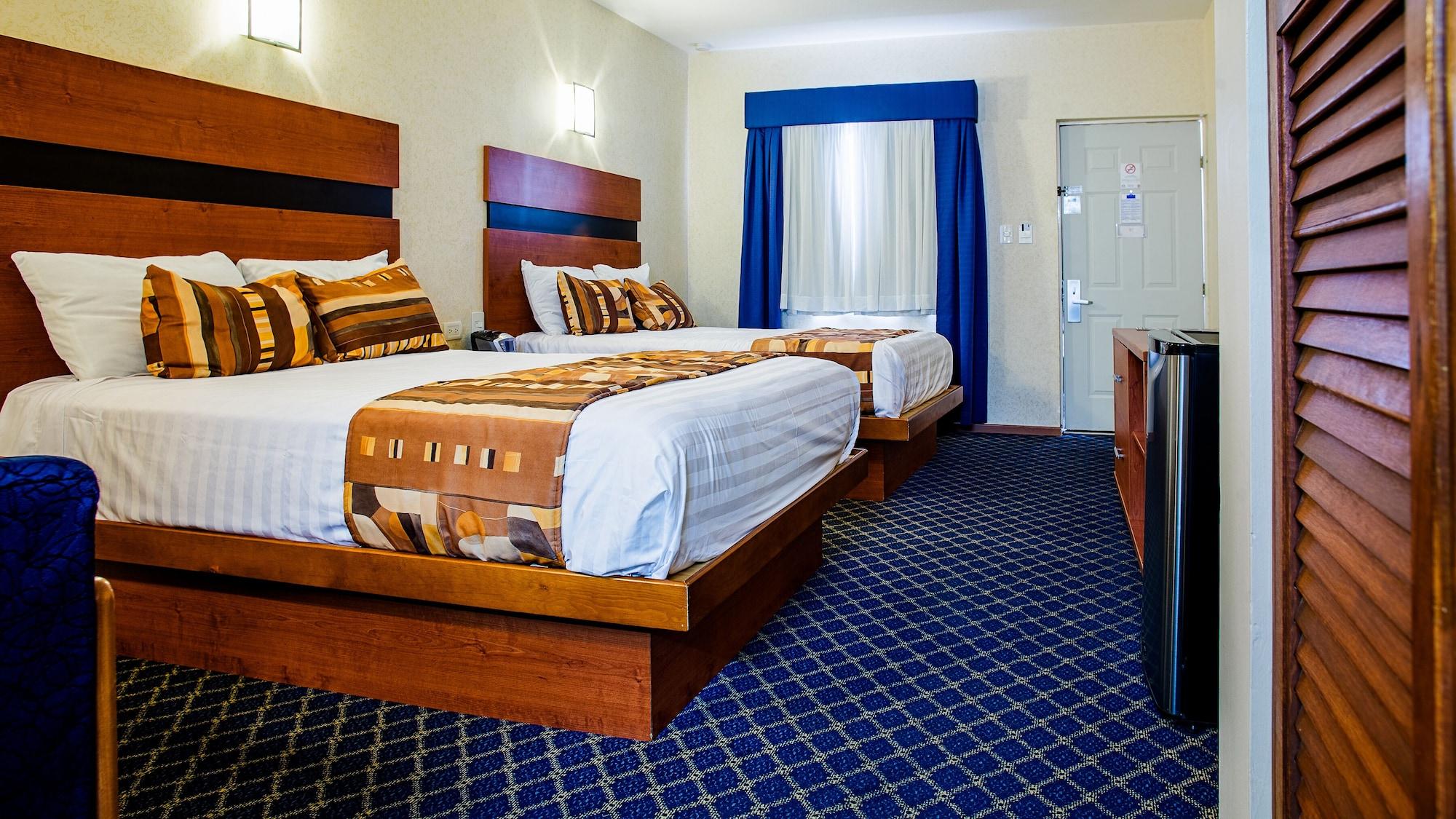 American Inn Hotel & Suites Parral Extérieur photo