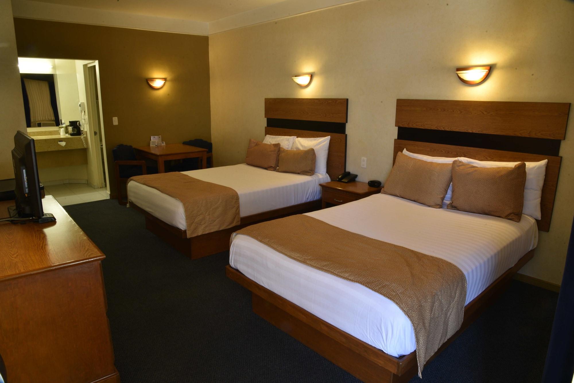 American Inn Hotel & Suites Parral Extérieur photo